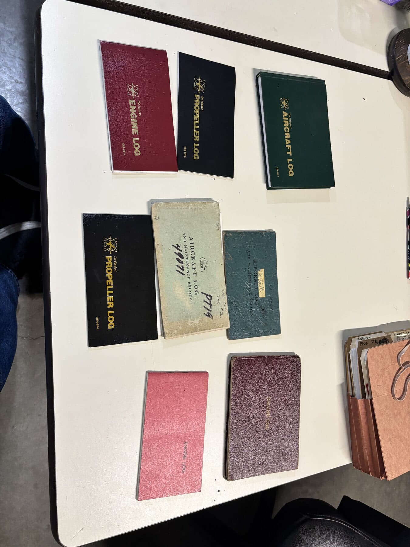 The original aircraft, engine, and propeller logbooks for PT-26 Cornell N49071