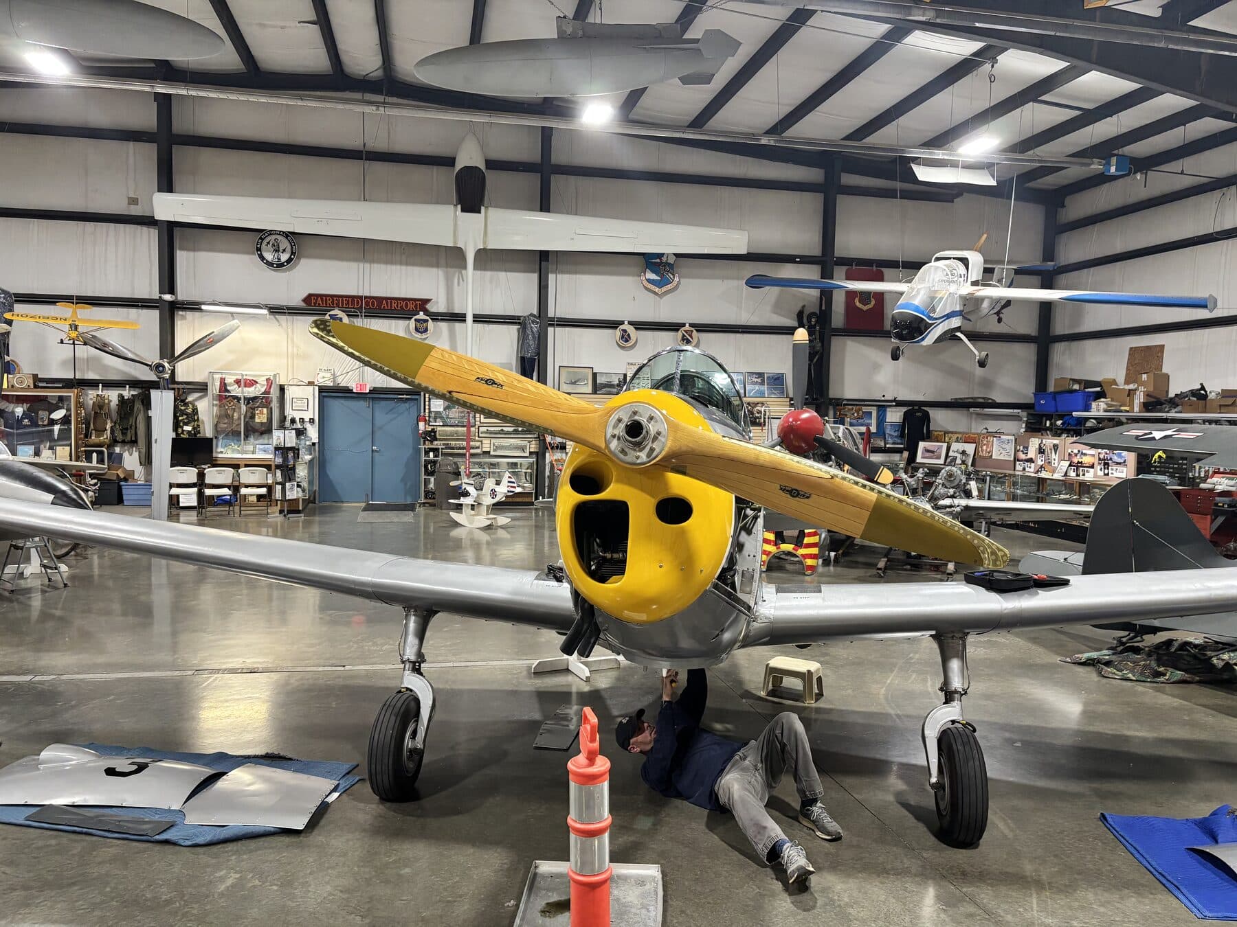 The Hawaii Wing's Fairchild PT-26 Cornell, N49071, under maintenance in the hangar